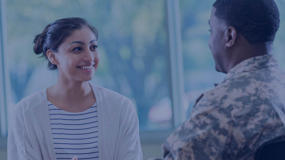 Young woman talks with recruitment officer
