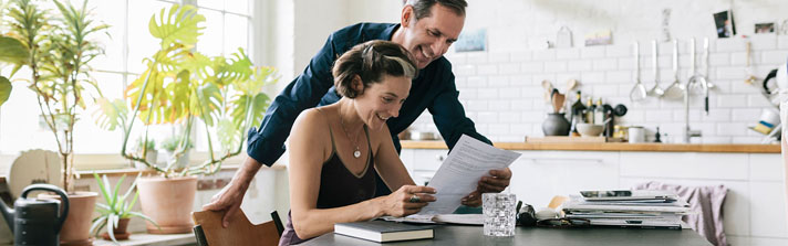 married couple excited about good tax information
