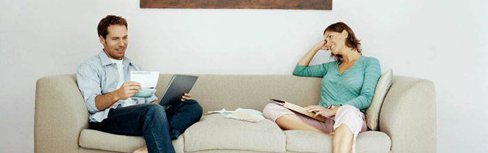 man and woman discussing the escrow process