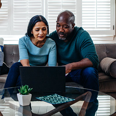 couple looking at laptop together