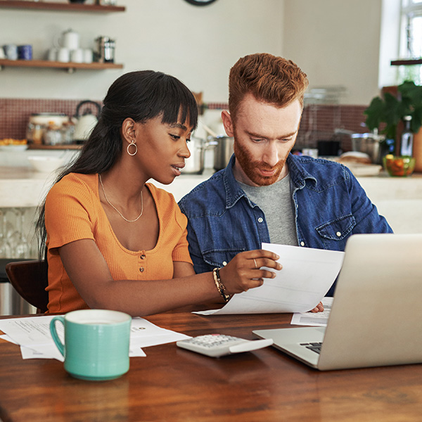 couple looking at paperwork