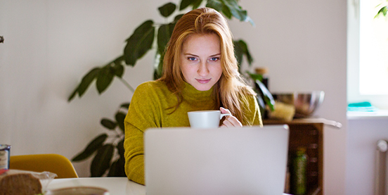 woman looking at laptop