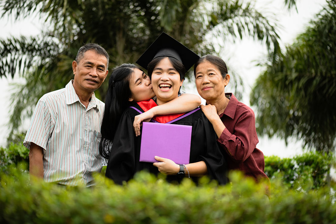 family celebrating graduation