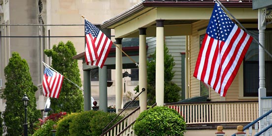 homes with American flags in front